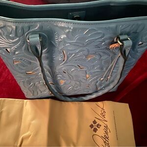 Lovely Patricia Nash Blue with Silver detail and beautiful suede lining.